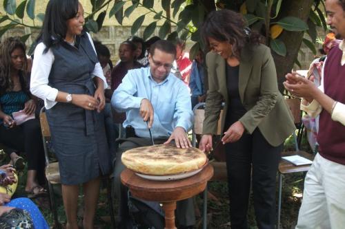 Goatley-cutting-bread-in-Ethiopia